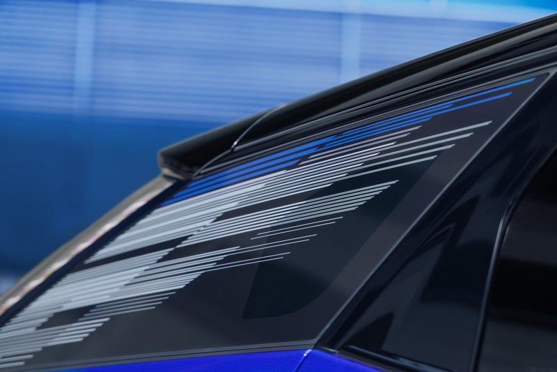 Close-up of the Modern Pattern on the 2026 OPTIQ-V Rear Quarter Glass | Airport Cadillac in Medford OR